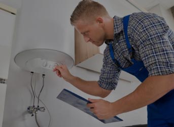 Proactive Plumbing technician installing a water heater